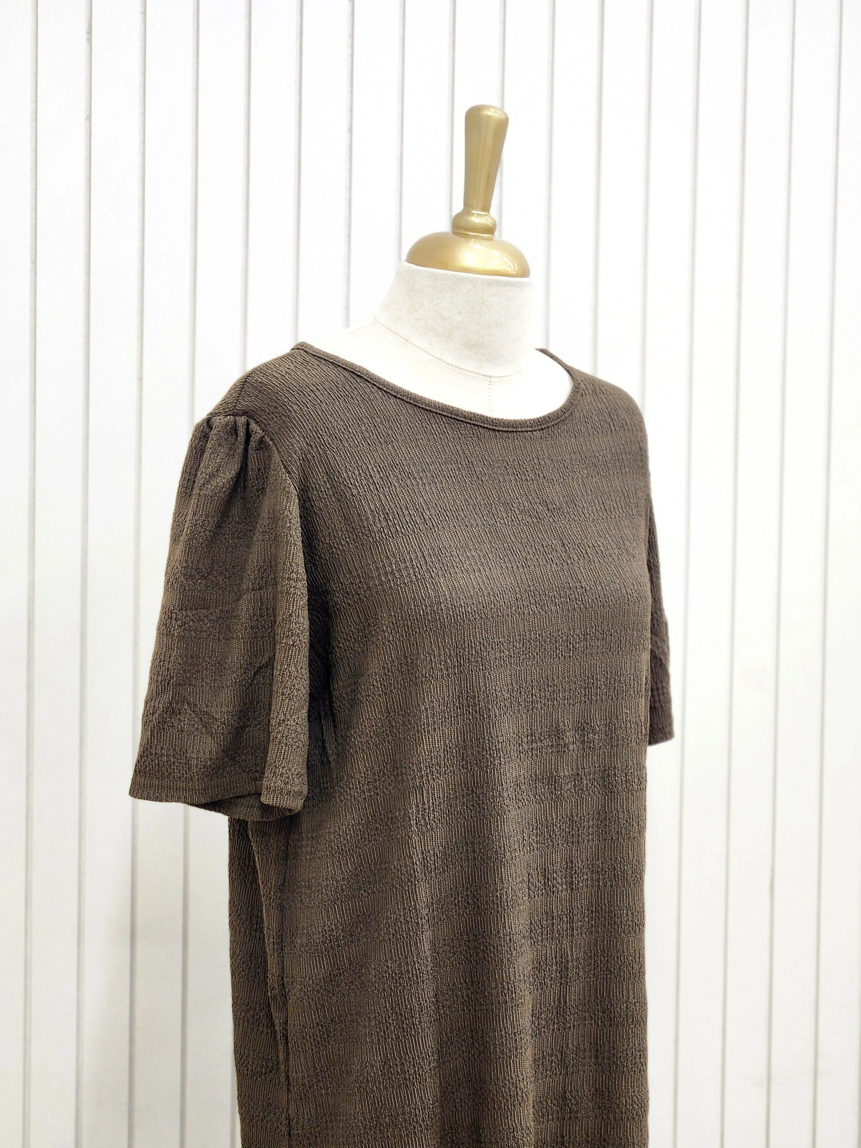 Knee length minimal brown slitted top